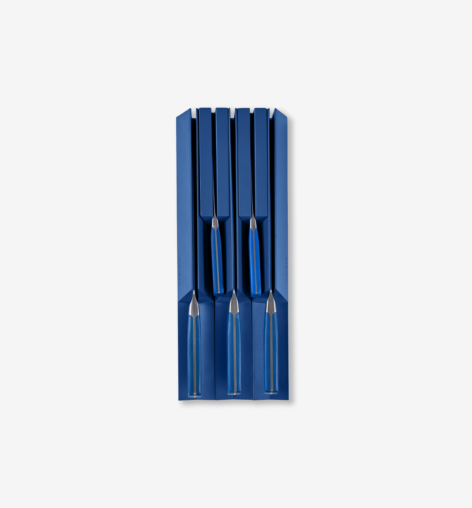 Blue steak knife set stored in matching blue knife block organizer