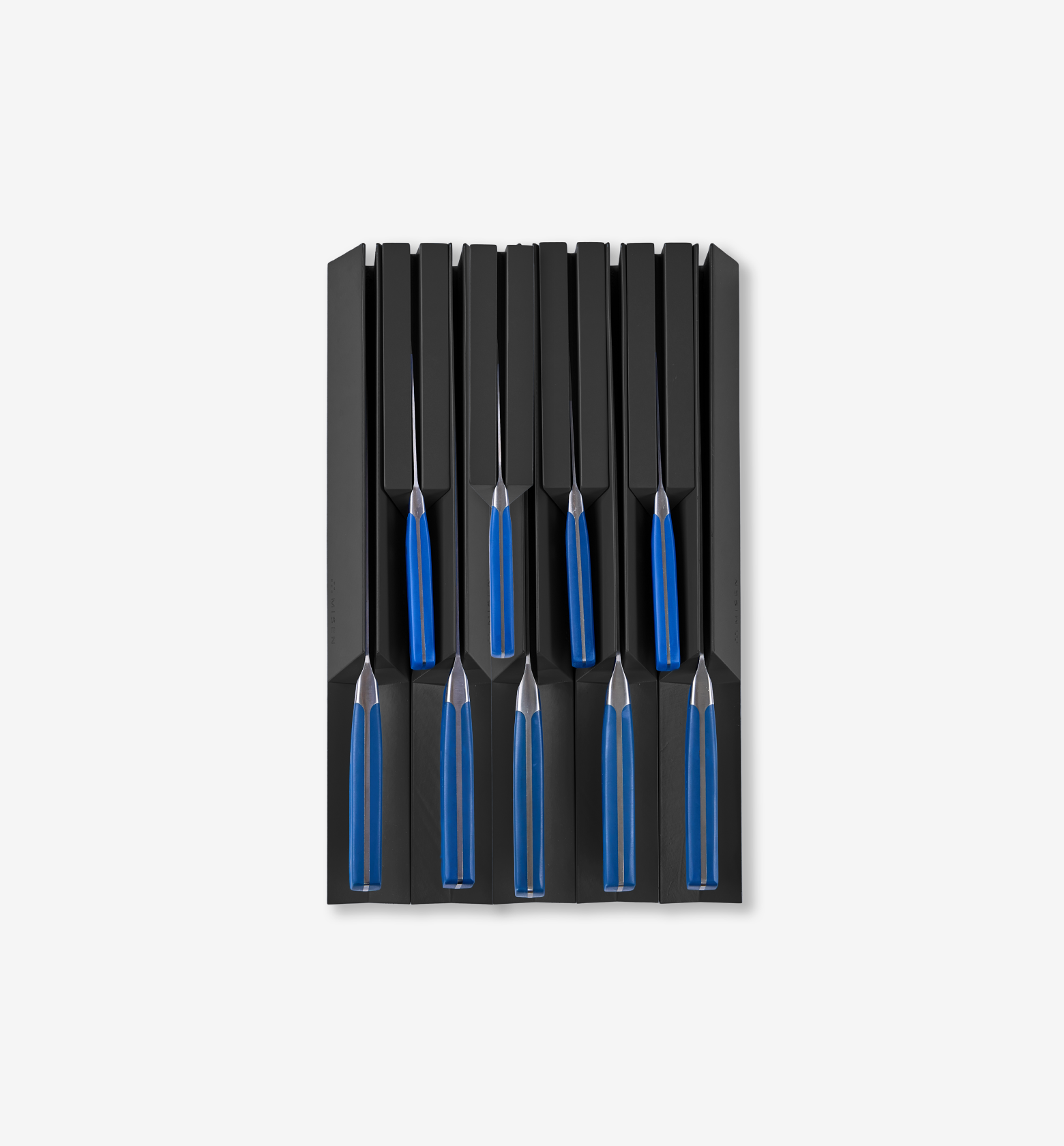 Set of steak knives with blue handles stored in black knife block organizer