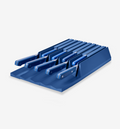 Blue knife set with matching drawer storage block holding multiple kitchen knives